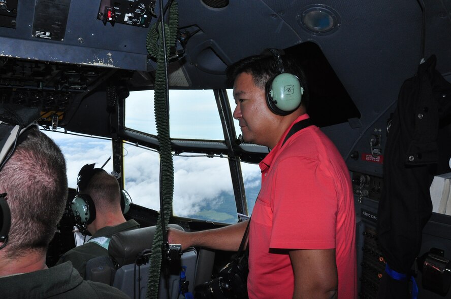 Dr. Y. Ralph Chu, Owner of Chu Vision Center and employer of Senior Airman Jennifer Groninger, 934th Aeromedical Staging Squadron, gets a view from the flight deck during Employers Day Aug. 4. (U.S. Air Force Photo/Paul Zadach)