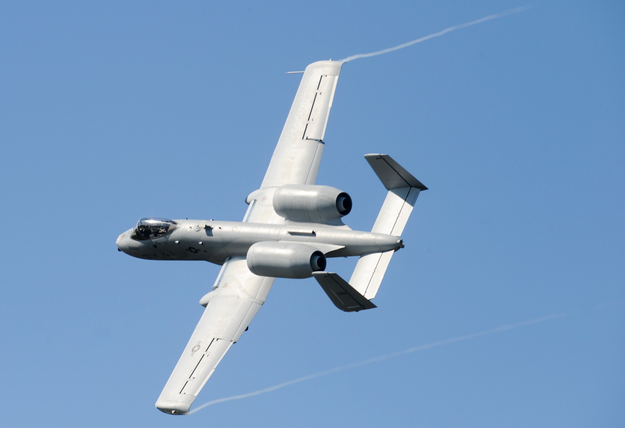 An A-10C Thunderbolt II from the 107th Fighter Squadron at Selfridge Air National Guard Base, Mich., flies toward ground targets during exercise Mountain Peak at Fort Drum, N.Y., July 29, 2012. U.S. Air Force joint terminal attack controllers directed the aircraft toward ground targets during the annual exercise. (U.S. Air Force photo by Airman 1st Class Douglas Ellis/Released) 
