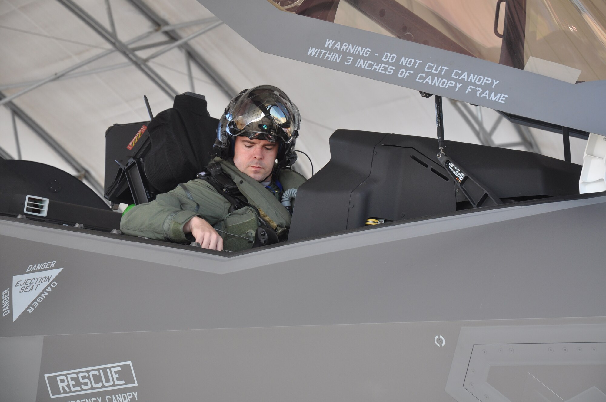 Major Jay Spohn performs pre-flight tasks in an F-35A Lightning II Joint Strike Fighter in July during preparations to becoming the Guard’s first F-35 instructor pilot.  He finished his last of six flights Aug. 3 to become a part of aviation history. Spohn is a Florida National Guard member and is embedded in the 33d Fighter Wing at Eglin Air Force Base where he is responsible for training up the fighter pilots who will fly the fifth-generation F-35 and will carry the U.S. Air Force into the next 50 years of air superiority. Photo by Major Karen Roganov, Team Eglin Public Affairs.