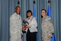 Gen. Alfred J. Stewart, Air Force Personnel Center commander, and Chief Master Sgt. Ruben Gonzales, AFPC command chief, present the Civilian Supervisory Category II of the Quarter Award to Rita Rivers, Air Force Personnel Center. The second-quarter Joint Base San Antonio-Randolph award winners were recognized during a ceremony at the base theater August 3.
(U.S. Air Force photo by Melissa Peterson)
