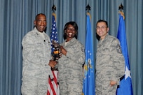 Gen. Alfred J. Stewart, Air Force Personnel Center commander, and Chief Master Sgt. Ruben Gonzales, AFPC command chief, present the Senior Enlisted Member of the Quarter to Master Sgt. Keila Brown, Air Force Personnel Center. The second-quarter Joint Base San Antonio-Randolph award winners were recognized during a ceremony at the base theater August 3.
(U.S. Air Force photo by Melissa Peterson)
