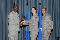 Gen. Alfred J. Stewart, Air Force Personnel Center commander, and Chief Master Sgt. Ruben Gonzales, AFPC command chief, present the Junior Enlisted Member of the Quarter Award to Airman 1st Class Heather Verdoza, 902nd Mission Support Group. The second-quarter Joint Base San Antonio-Randolph award winners were recognized during a ceremony at the base theater August 3.
(U.S. Air Force photo by Melissa Peterson)
