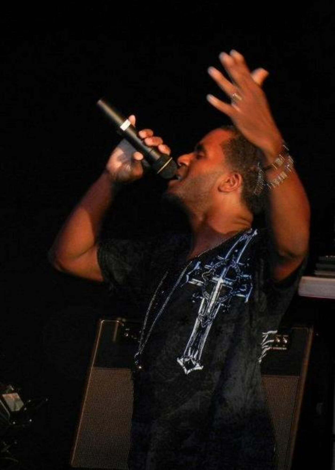 Staff Sgt. Christopher Watts, 325th Operations Support Squadron aircrew flight equipment technician, performs his music during a concert. (U.S. Air Force courtesy photo)