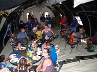 Approximately 120 deployed members’ spouses and children gathered with wing leadership in the Hearts Apart tent during the McConnell Beach Party Aug. 3, 2012, McConnell Air Force Base, Kan. Hearts Apart is a morale building program for spouses, children and families of military members who are currently deployed, on an extended temporary duty assignment or serving a remote tour. (courtesy photo)