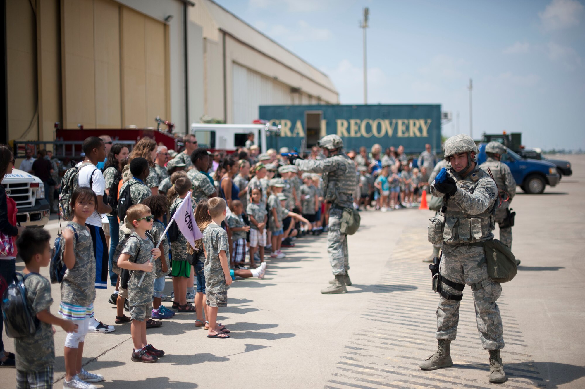 Operation Deployment participants watch a demonstration by the 39th Security Forces Squadron Aug. 3, 2012, at Incirlik Air Base, Turkey. The event gave children and spouses of service members the opportunity to learn about the deployment process. Almost 200 people participated in the event. (U.S. Air Force photo by Senior Airman Clayton Lenhardt/Released)