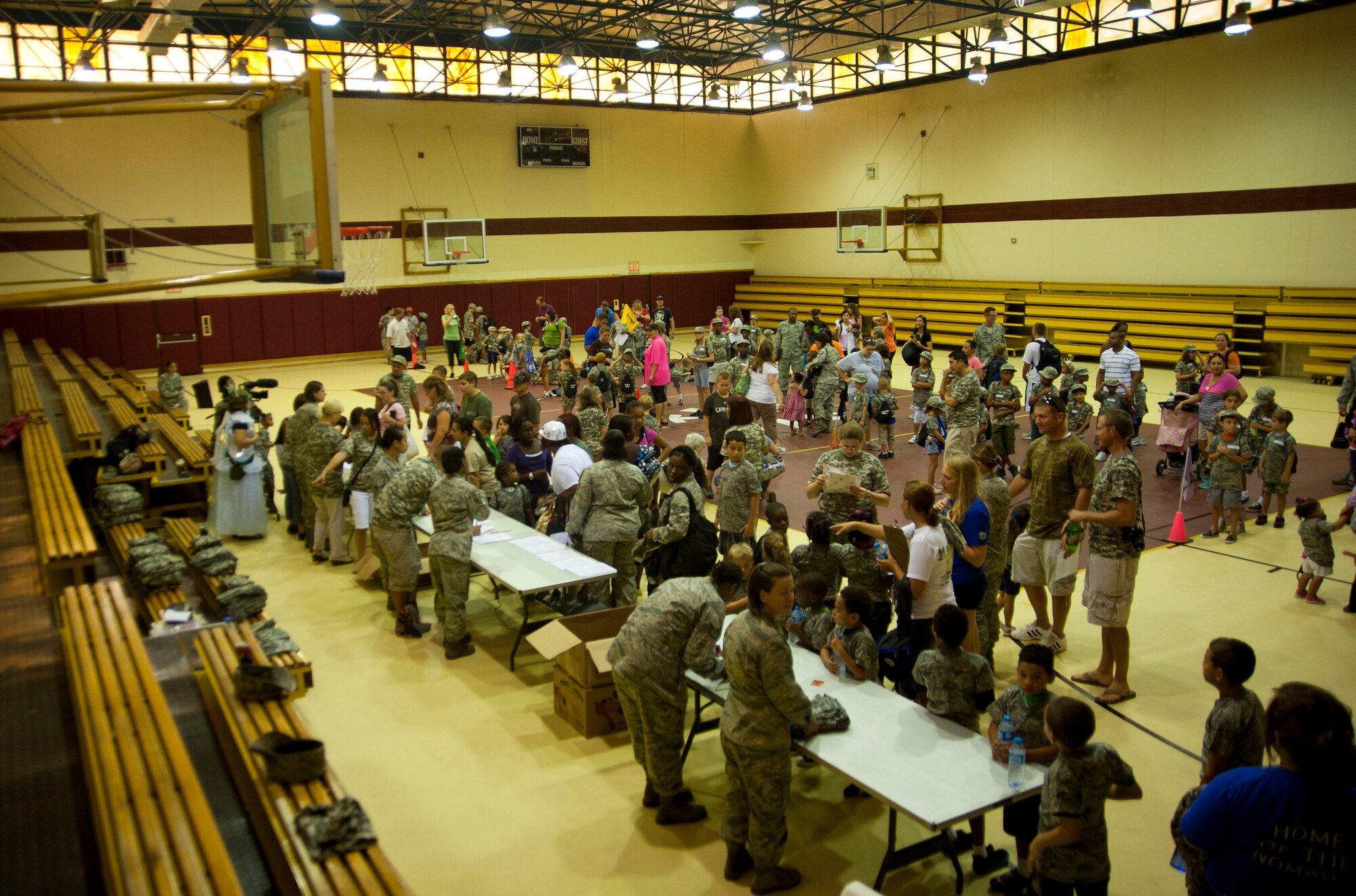 Members of Team Incirlik gather in the fitness center basketball court to begin Operation Deployment Aug. 3, 2012, at Incirlik Air Base, Turkey. The event gave children and spouses of service members the opportunity to learn about the deployment process. Almost 200 people participated in the event. (U.S. Air Force photo by Senior Airman Clayton Lenhardt/Released)