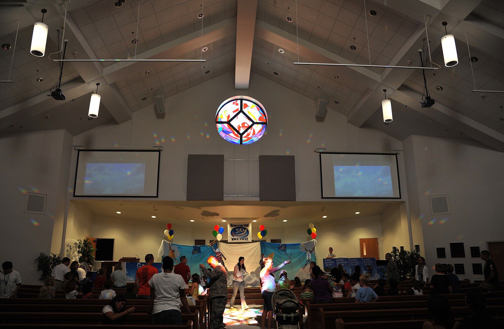 GOODFELLOW AIR FORCE BASE, Texas-- Children, parents, and volunteers gather for the start of vacation bible school in the Taylor Chapel Aug. 3. The children raised money for mosquito nets to protect less fortunate kids from malaria. (U.S. Air Force photo/Airman 1st Class Michael Smith) 
