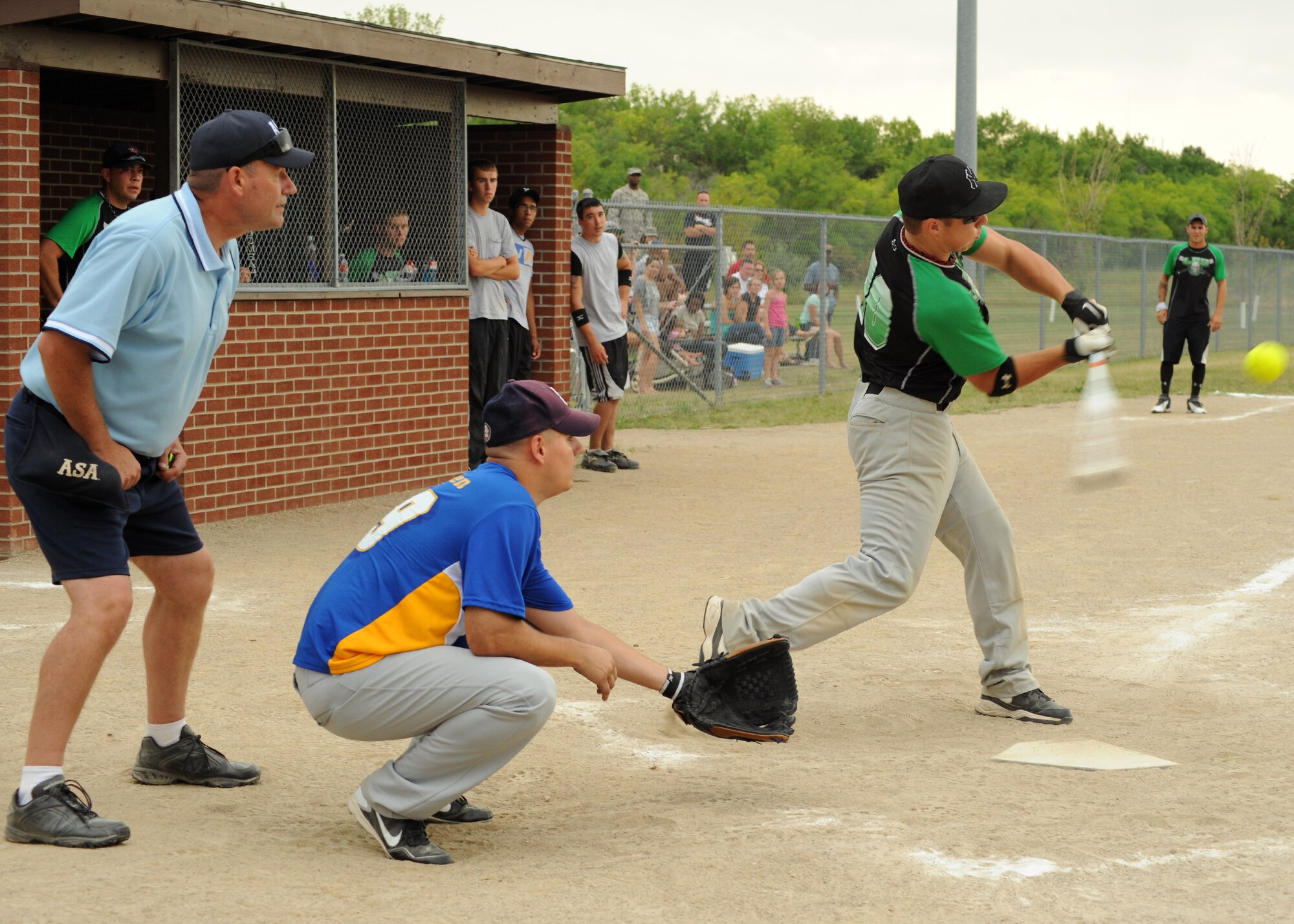 Airman Tyler Berwald, 319th Logistics Readiness Squadron, swings the bat during the intramural softball championship game, Aug. 1, 2012, on Grand Forks Air Force Base, N.D.  The 69th RG defeated the 319th LRS  18-11.  (U.S. Air Force photo by Airman 1st Class Xavier Navarro)