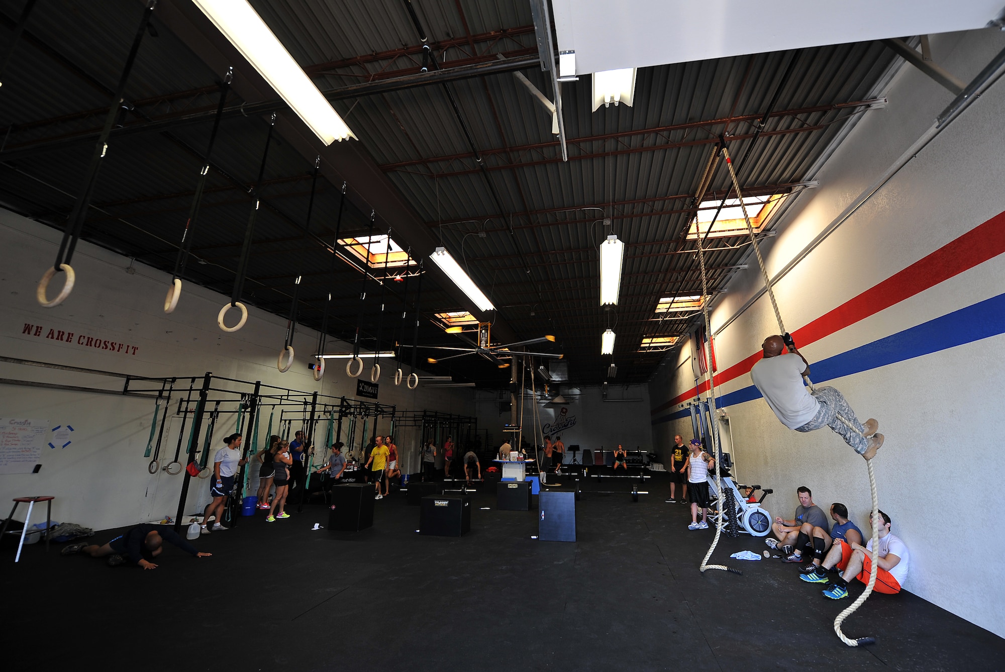 SAN ANGELO, Texas-- 31 Heroes Project participants work out at San Angelo CrossFit August 4. San Angelo CrossFit raised close to $2,500 for the 31 Heroes Project, which exist to honor fallen heroes killed in action on Aug. 6, 2011. Raising awareness through fitness, the projects aims to garner funds for programs that provide support to families of all fallen military heroes. (U.S. Air Force photo/Airman 1st Class Michael Smith) 