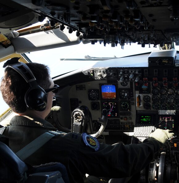 ALANTIC OCEAN – Capt. Michael Mcfarland, 351st Air Refueling Squadron, keeps a KC-135 Stratotanker steady while fuel is passed to an F-15E Strike Eagle during an aerial refueling mission over the Atlantic Ocean Aug. 2, 2012. Mcfarland’s brother, Capt. John Mcfarland, 494th Fighter Squadron, was the weapons system officer on the receiving aircraft during the mission. (U.S. Air Force photo/Senior Airman Rachel Waller)