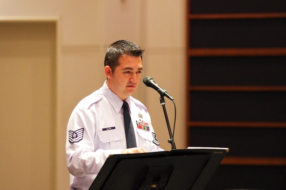 YOKOTA AIR BASE, Japan -- Tech. Sgt. E. Justin Allen, Band of the Pacific-Asia vocalist, studies a musical selection during a rehearsal of the Pacific Showcase Jazz Ensemble at the Band of the Pacific-Asia, Yokota Air Base, Japan, Aug. 6, 2012.  As the vocalist for the group Allen performs many big band classics and jazz standards from memory while displaying the showmanship required to actively engage audiences across the PACAF region.  (U.S. Air Force photo/Senior Airman Brian Lumpkin)