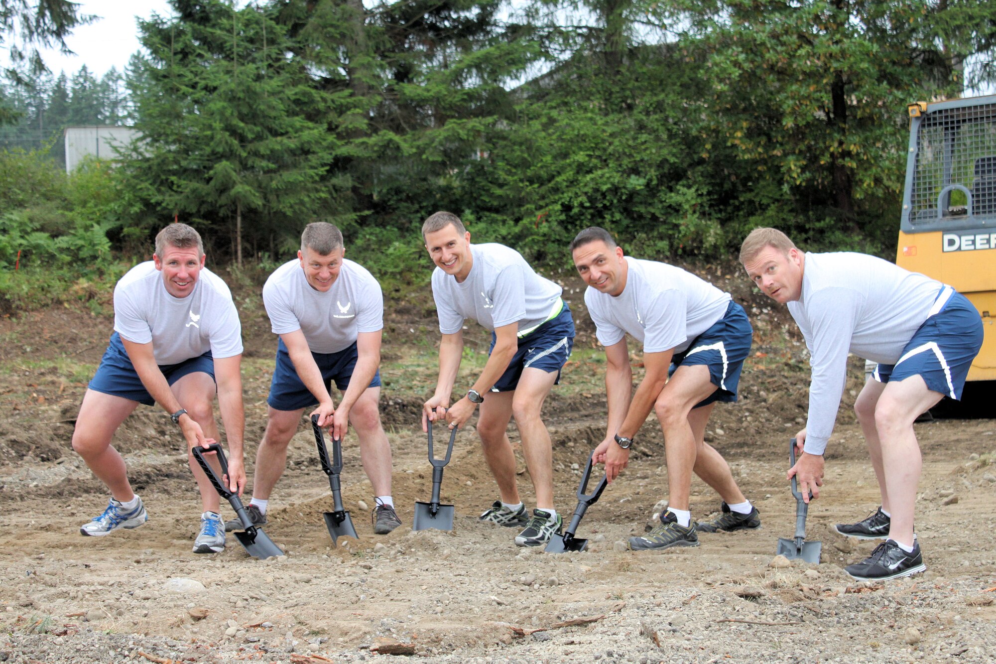 Joint Base Lewis-McChord, Wash. – Chief Master Sgt. Jason Quesenberry, 1st Air Support Operations Group chief enlisted manager, Col. Steven Gray 1st ASOG commander, Lt. Col. Bill Courtemanche, 1st Weather Squadron commander, Maj. Paul Lucyk, 1st WS director of operations, and Senior Master Sgt. Thomas Briggs, 1st WS superientendent, perform the ceremonial ground on a brand new 1st WS headquarters facility here July 13. The new complex is part of a $6.4 million Army project and will increase the capabilities of this group of 65 battlefield Airmen and five civilians. (Courtesy photo)