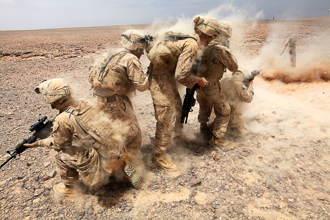 JABEL PETRA, Jordan - Combat engineers and assaultmen with Battalion Landing Team 1st Battalion, 2nd Marine Regiment, 24th Marine Expeditionary Unit detonate an improvised linear charge during basic demolition-sustainment training here, May 9, 2012, in preparation for Exercise Eager Lion 12, the largest annual exercise in the Central Command area of operations. More than 1,000 Marines and Sailors from the 24th MEU are scheduled to participate in various events ashore throughout Jordan to maximize multi-lateral training opportunities and continue to build relationships with partners throughout the region.  Eager Lion 12 is the second major exercise for the 24th MEU and Iwo Jima Amphibious Ready Group after deploying in March to serve as a forward-deployed crisis response force. (Official Marine Corps Photo by Sgt. Richard Blumenstein)