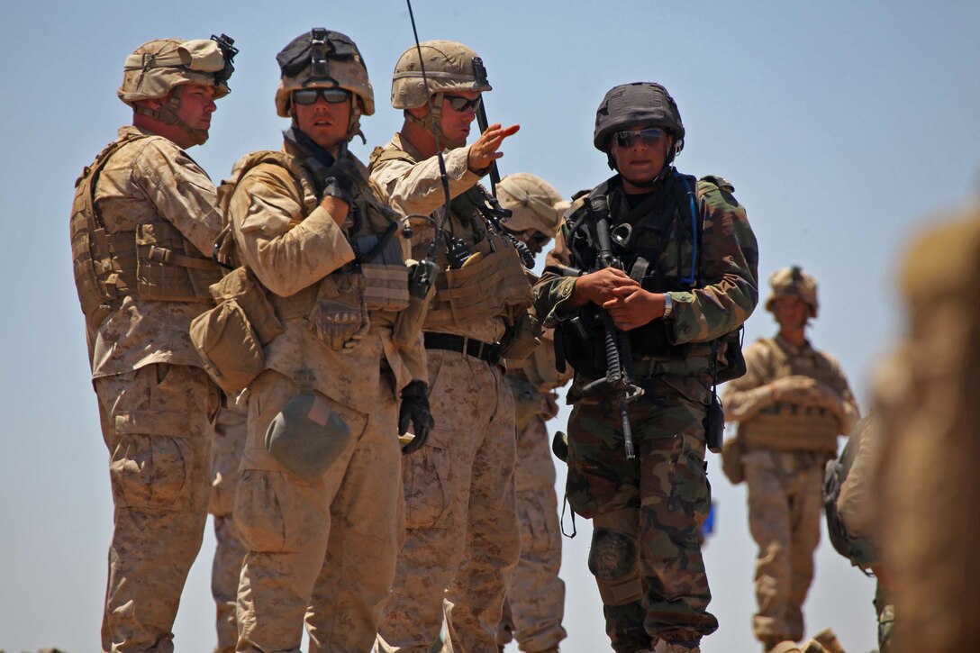 JABEL PETRA, JORDAN - Marines with Charlie Company and Weapons Company, Battalion Landing Team 1st Battalion, 2nd Marine Regiment, 24th Marine Expeditionary Unit, and Soldiers of the Lebanese Army conduct a live-fire, combined arms range, May 12, 2012, during Exercise Eager Lion 12, the largest annual exercise in the U.S. Central Command area of operations. Eager Lion 12 is scheduled to take place throughout the month of May and is designed to strengthen military-to-military relationships of more than 15 participating partner nations. This is the second major exercise for the 24th MEU who, along with the Iwo Jima Amphibious Ready Group, is currently deployed to the Central Command area of operations as a theater reserve and crisis response force. (Official Marine Corps Photo by Gunnery Sgt Chad R. Kiehl)