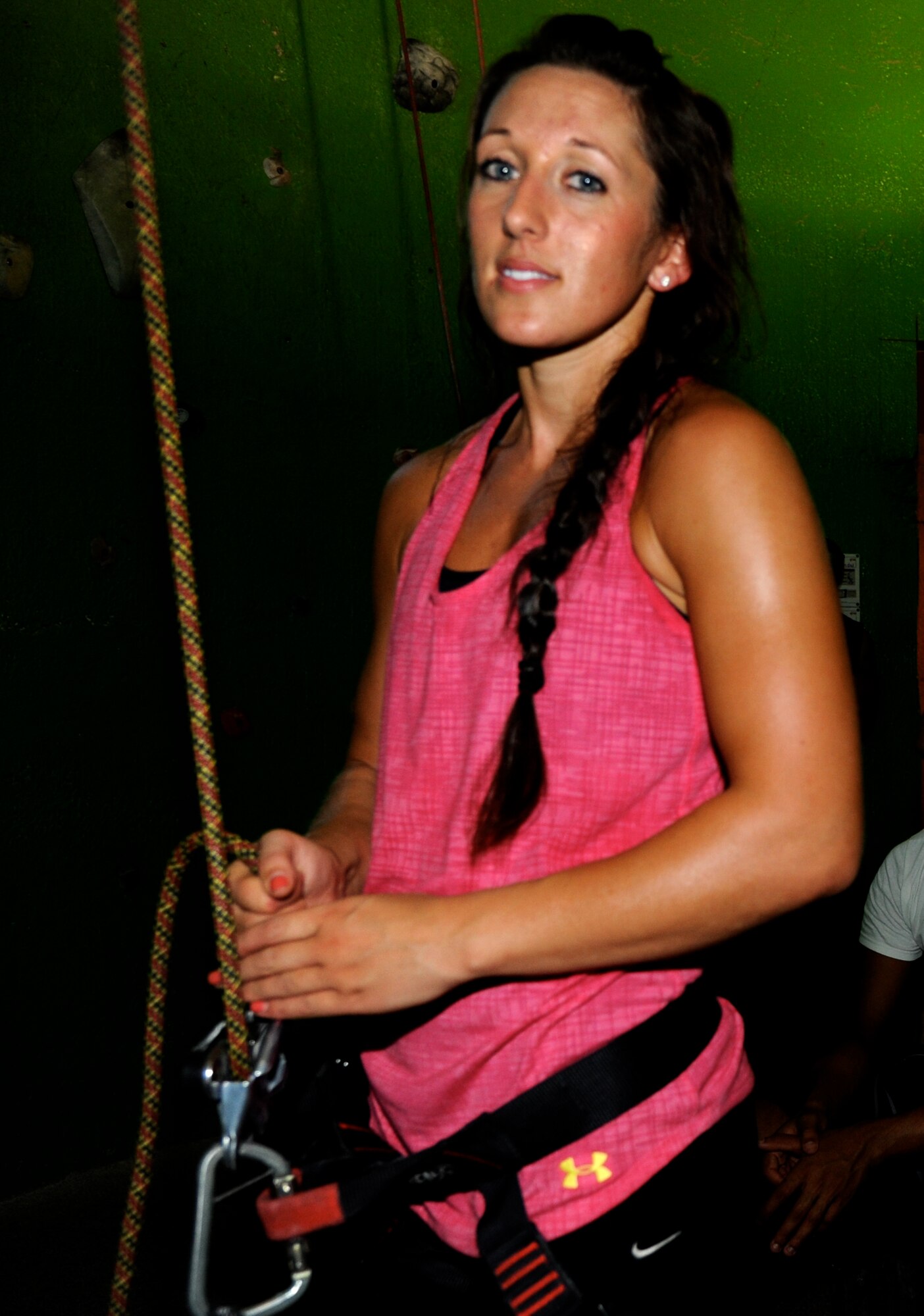 Airman 1st Class Alisha Jones, an air traffic controller with the 71st Operations Support Squadron at Vance Air Force Base, Okla., takes a break between climbs at Rocktown Climbing Gym in Oklahoma City, July 28. She was one of a group of single Airmen the Vance Chapel hosted to a day of rock climbing and an evening meal at Spaghetti Warehouse. (U.S. Air Force photo/ Airman 1st Class Frank Casciotta)