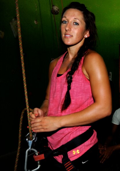 Airman 1st Class Alisha Jones, an air traffic controller with the 71st Operations Support Squadron at Vance Air Force Base, Okla., takes a break between climbs at Rocktown Climbing Gym in Oklahoma City, July 28. She was one of a group of single Airmen the Vance Chapel hosted to a day of rock climbing and an evening meal at Spaghetti Warehouse. (U.S. Air Force photo/ Airman 1st Class Frank Casciotta)