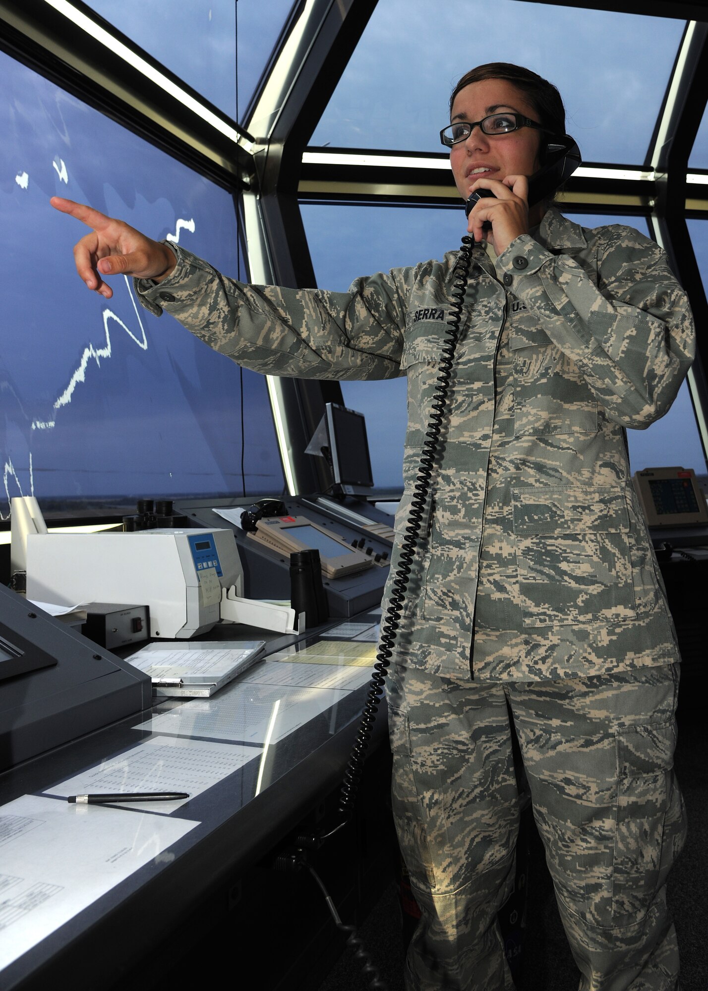 Senior Airman Trista Serra, 319th Operations Support Squadron air traffic controller, receives a flight plan, Aug. 1, 2012, on Grand Forks Air Force Base, N.D.  As an air traffic controller, Serra’s mission is to keep aircraft and pilots safe by providing accurate flight plan information. (U.S. Air Force photo/Airman 1st Class Ashley N. Taylor)