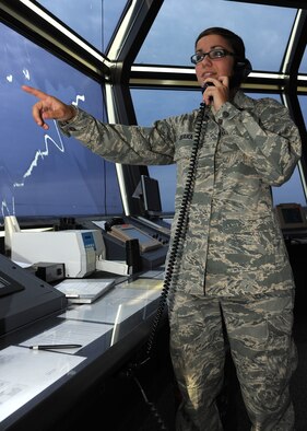 Senior Airman Trista Serra, 319th Operations Support Squadron air traffic controller, receives a flight plan, Aug. 1, 2012, on Grand Forks Air Force Base, N.D.  As an air traffic controller, Serra’s mission is to keep aircraft and pilots safe by providing accurate flight plan information. (U.S. Air Force photo/Airman 1st Class Ashley N. Taylor)