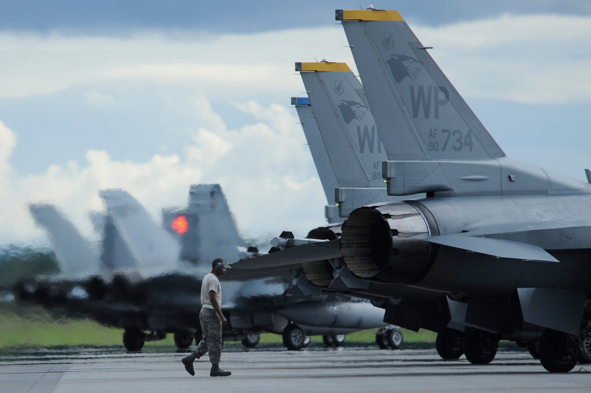A maintainer inspects an F-16 Fighting Falcon assigned to the 80th Fighter Squadron from Kunsan Air Base, Korea prior to taking flight during RED FLAG-Alaska 12-3 Aug. 6, 2012, Eielson Air Force Base, Alaska. The exercise showcases the abilities of aircrew to quickly and safely prepare aircraft for wartime missions. (U.S. Air Force photo/Staff Sgt. Jim Araos)