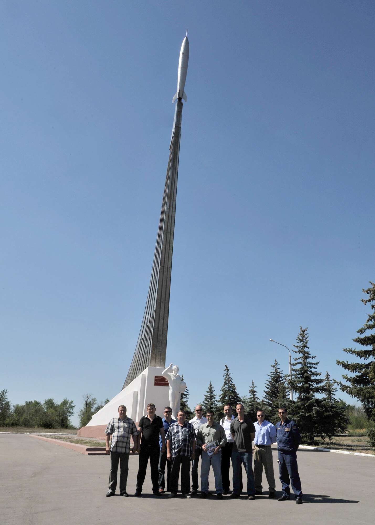 Barksdale Air Force Base members and Russian Federation air force personnel stand in front of a monument outside of Engels, Russia, July 26. The monument is where Cosmonaut Yuri Gagarin, the first person in space, landed a Russian space capsule. Col. Andrew Gebara, 2nd Bomb Wing commander, and a team of experts visited the monument and other cultural sites in conjunction with an airfield site survey. (Courtesy photo)