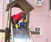 Airman First Class Deion Smith, 916th Crew Communications, helps with a community project while deployed to Turkey. (USAF photo courtesy of SSgt. Kenya McCall, 916th SARM)