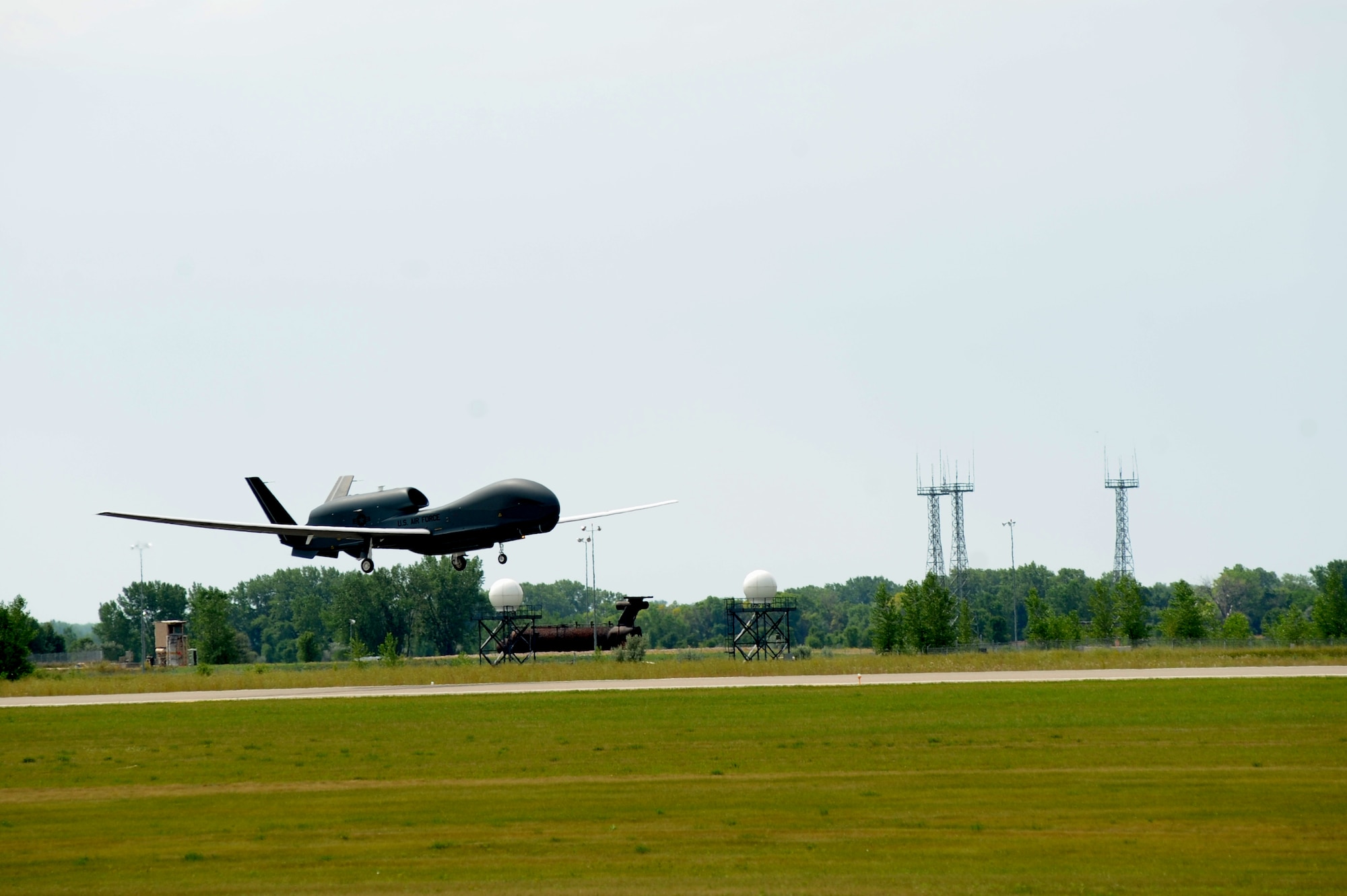 An RQ-4 Global Hawk from the 69th Reconnaissance Group takes off on a training flight from Grand Forks Air Force Base, N.D., on Aug. 7, 2012. (U.S. Air Force photo/Staff Sgt. Amanda Grabiec)