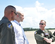 Mr. Chris Cannon, military liaison for Sen. Kay Hagan, talks with Chief, Tony Parrish and Lt. Col. Phil Heseltine, 916th Operations Group, on the ramp of the 916th Air Refueling Wing on Aug. 6, 2012. (USAF photo by SSgt. Terrica Jones, 916ARW/PA)