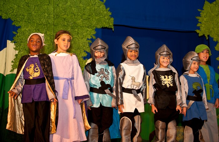 Nellis children perform in the Missoula Children’s Theatre production of “King Arthur’s Quest” Aug. 12, 2011, in the Base Theater at Nellis Air Force Base, Nev. This musical, conceived and written by Michael McGill, MCT executive director, tells a story of King Arthur, the Knights of the Round Table and the people of Camelot and how they deal with troubles that include being visited by the ghost of King Arthur’s father, being confronted by a giant and being terrorized by a dragon. (U.S. Air Force photo by Airman 1st Class George Goslin/Released)

