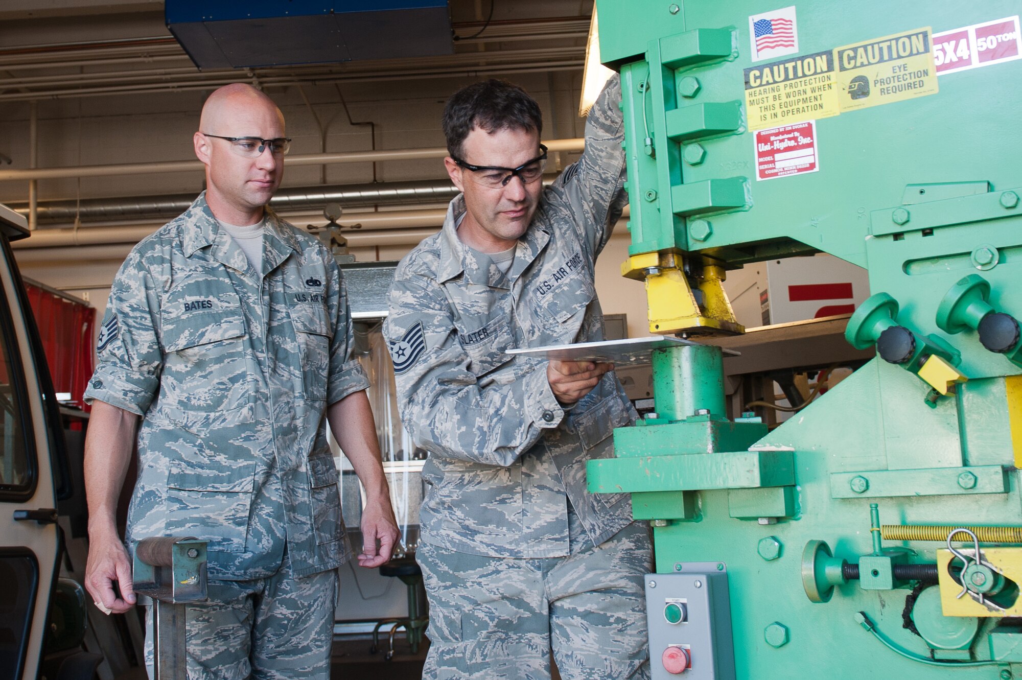 The 12th annual Toy Show, during Family Day Sept. 9 at Gowen Field, will showcase the hobbies and interests of Idaho Air National Guard Members. Staff Sgt. Phil Bates (left) and Tech Sgt. Greg Slater, both machinists in the 124th Maintenance Squadron's Metals Technology shop, and gearheads in their free time, have helped coordinate the Toy Show since its beginning.