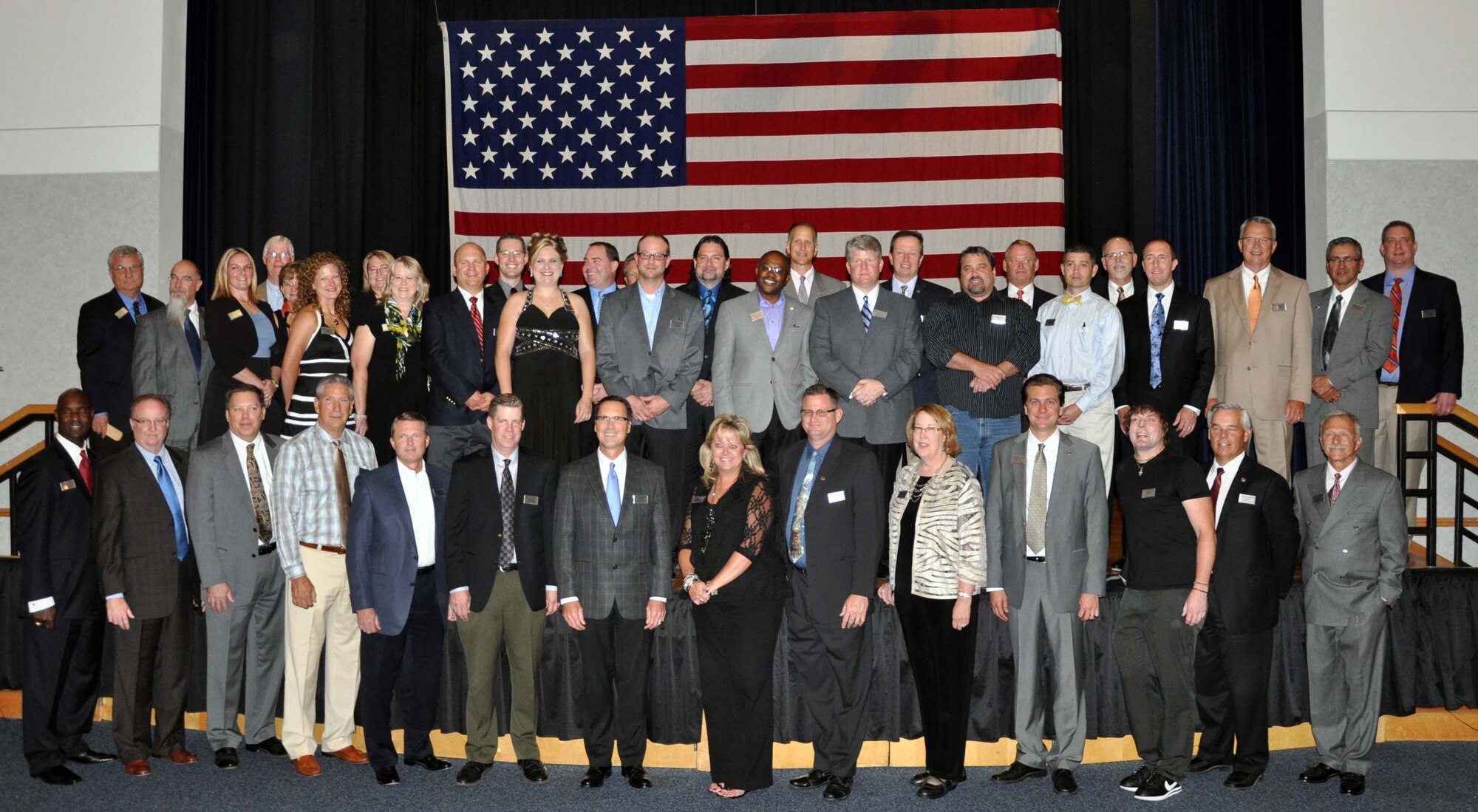 McConnell Air Force Base Honorary Commanders pose for a picture following an Honorary Commander Change of Command ceremony held on base August 7, 2012.  The 931st Air Refueling Group welcomed four new Honorary Commanders during the ceremony.  The McConnell Honorary Commander Program is a joint venture between the active duty 22nd Air Refueling Wing and the Reserve 931st Air Refueling Group.  (U.S. Air Force photo by 1st Lt. Zach Anderson)