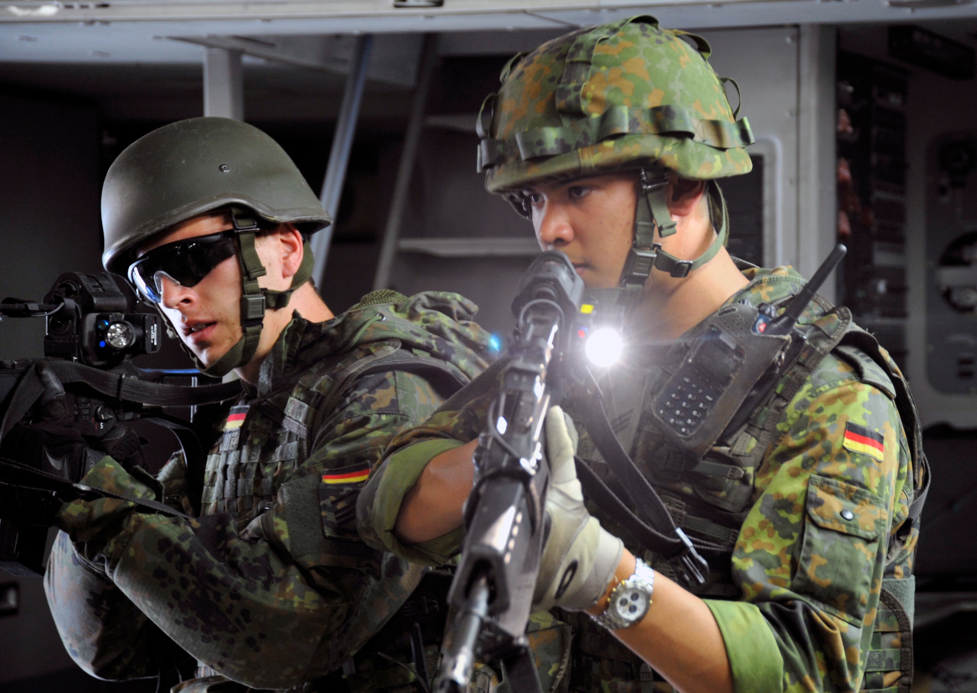 Members of the German air force practice security techniques on a C-17 Globemaster III Aug. 1, 2011, Ramstein Air Base, Germany. These techniques include hostage recovery, nuclear surety and other methods ensuring preparation in case of an attack on an aircraft. (U.S Air Force photo/Airman 1st Class Trevor Rhynes)