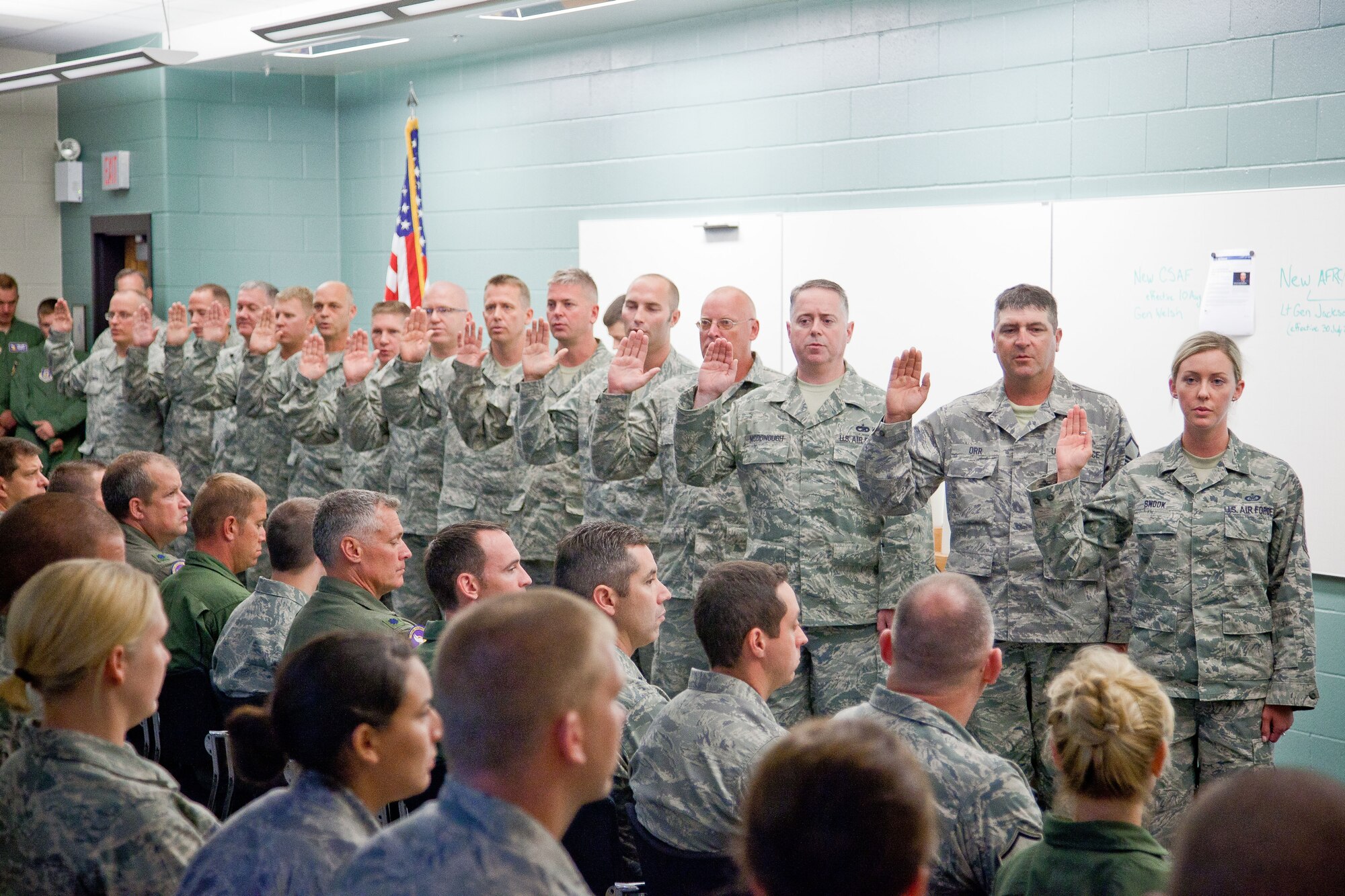 New 934th Airlift Wing Master Sergeants take the oath of rank during the Non-Commisioned Officer Recognition ceremony Saturday at the Minneapolis-St. Paul Air Reserve Station, Minn.  (U.S. Air Force Photo/Shannon McKay)