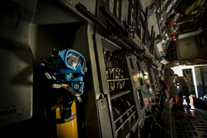 A recently replaced Quick Don Mask sits at the ready on a C-17 Globemaster III after a post-flight equipment swap-out by aircrew flight equipment technicians with the 437th Operations Support Squadron Aug. 6, 2012, at Joint Base Charleston - Air Base, S.C. Members of AFE are essential to aircrews by making sure all flight equipment is in working order, including emergency safety equipment such as parachutes and survival equipment. (U.S. Air Force photo by Airman 1st Class George Goslin)