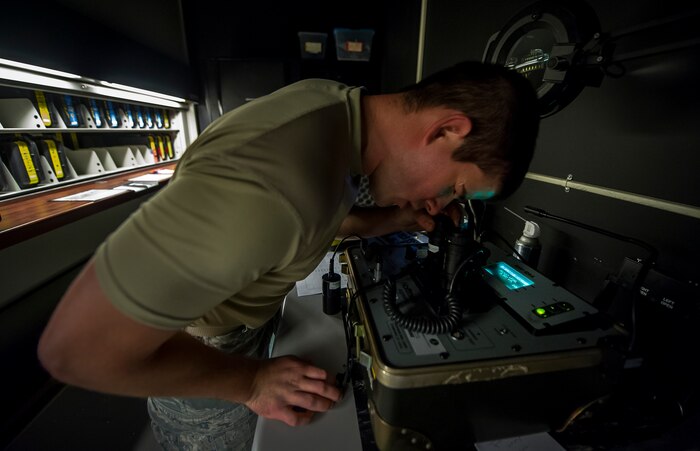 Senior Airman Daniel Godfrey, 437th Operations Support Squadron aircrew flight equipment technician, performs a post-flight inspection on a pair of night-vision goggles Aug. 6, 2012, at Joint Base Charleston - Air Base, S.C. Members of AFE are essential to aircrews by making sure all flight equipment is in working order, including emergency safety equipment such as parachutes and survival equipment. (U.S. Air Force photo by Airman 1st Class George Goslin)
