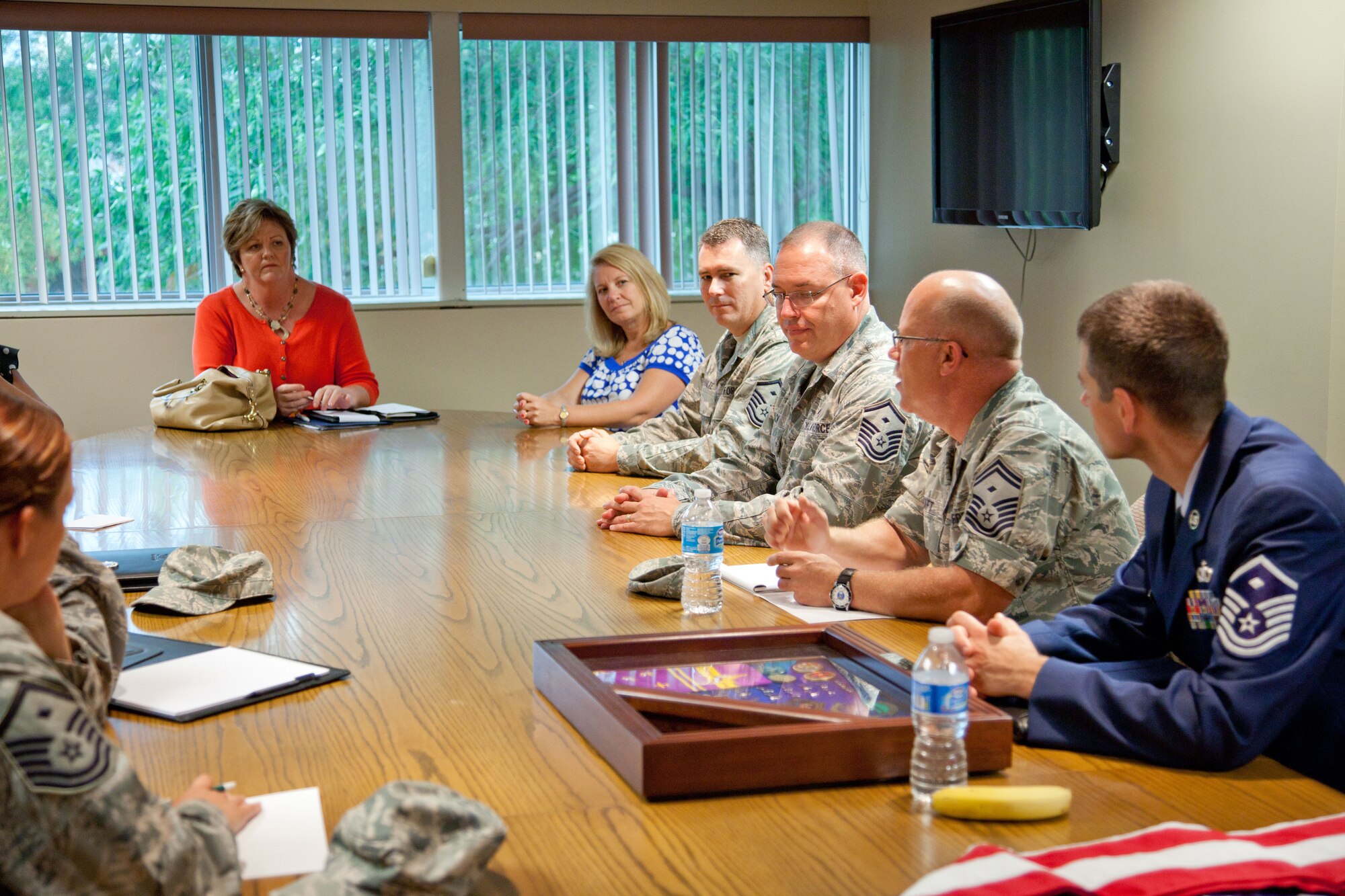 Kim Farris and 934th Airlift Wing command spouses meet with First Sergeants to discuss the wing.  Mrs. Farris and her husband, 22nd Air Force Commander Maj. Gen. Wallace W. Farris, are visiting the wing during the August Unit Training Assembly.  (Air Force Photo/Shannon McKay)