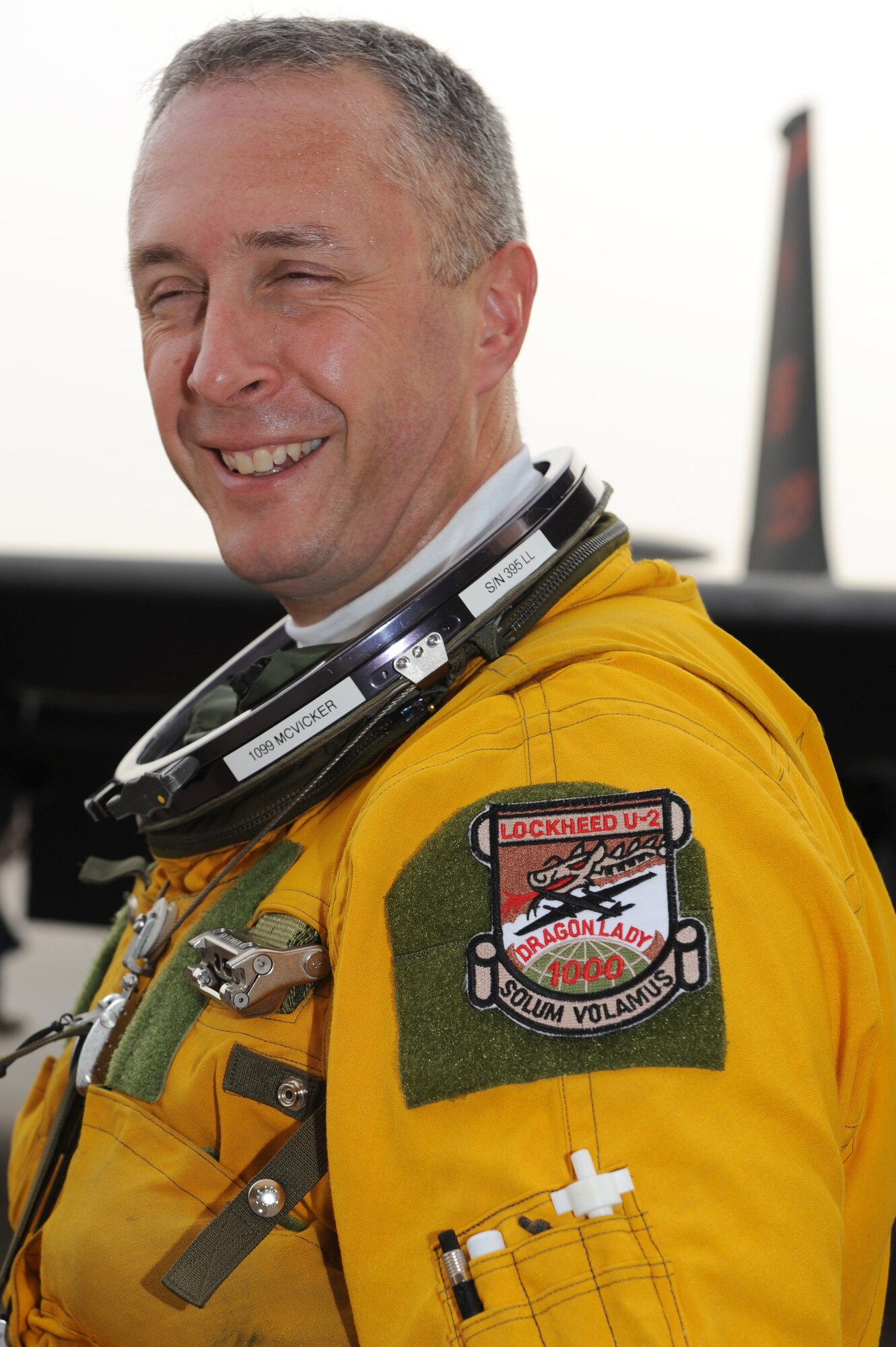 SOUTHWEST ASIA - Lt. Col. Andrew McVicker, 99th Expeditionary Reconnaissance Squadron commander, sports a smile and his new 1,000-hour flight patch at the 380th Air Expeditionary Wing Aug. 7, 2012. McVicker, deployed from the 9th Reconnaissance Wing at Beale Air Force Base, Calif., went over the 1,000 flying-hour mark. (U.S. Air Force photo/Master Sgt. Scott MacKay)