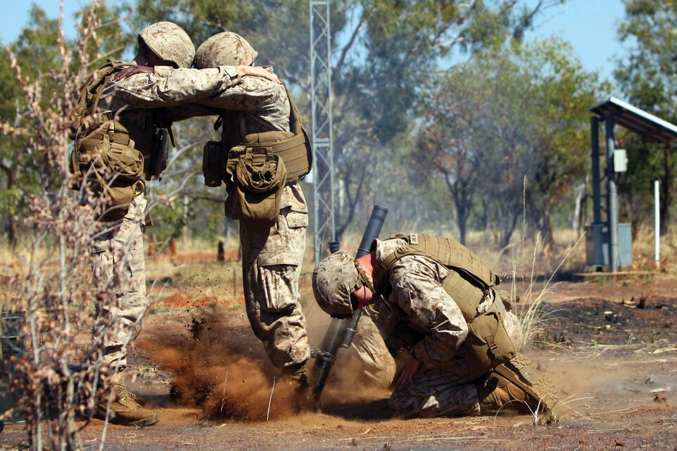 Marines with Company F fire an illumination round from a 60 mm mortar in order to provide illumination of targets for aircraft with Marine Fighter-Attack Squadron 232 during Exercise Southern Frontier 2012 in Delamere Training Area, Northern Territory, Australia, July 24. Southern Frontier is a bilateral exercise conducted between the U.S. Marine Corps and the Australian Defence Force in order to develop greater interoperability and a seamless response to regional crises. Company F is part of 2nd Battalion, 3rd Marine Regiment, 3rd Marine Division, III Marine Expeditionary Force. VMFA-232 is part of Marine Aircraft Group 12, 1st Marine Aircraft Wing, III MEF.