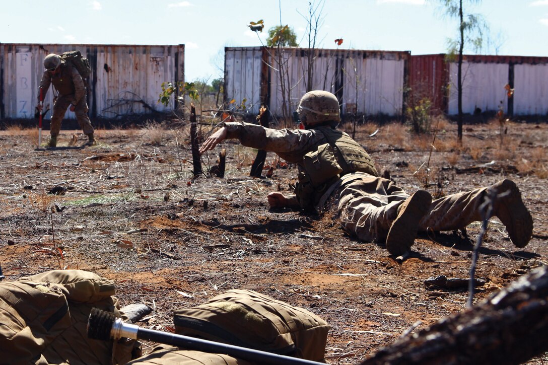 A Marine with Company F sets up a 60 mm mortar to provide accurate illumination for suppression of targets by aircraft with Marine Fighter-Attack Squadron 232 during Exercise Southern Frontier 2012 in Delamere Training Area, Northern Territory, Australia, July 24.
