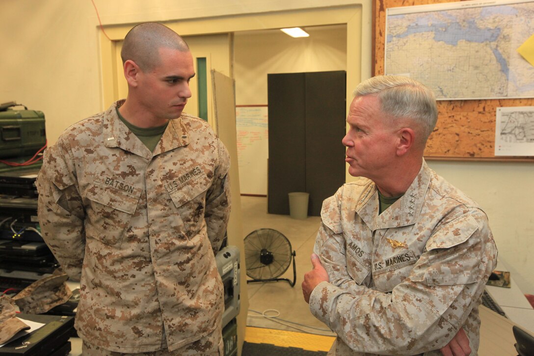 NAVAL AIR STATION SIGONELLA, Italy - Commandant of the Marine Corps, Gen. James Amos, right, speaks with 1st Lt. Louis Batson, the officer in charge of the Joint Task Force Enabler detachment, 24th Marine Expeditionary Unit, during a visit to Naval Air Station Sigonella July 18, 2012, where Amos visited the Marines of the detachment during their deployment in support of 24th MEU.  The JTF-E Marines were positioned in Sigonella at the beginning of the 24th MEU's deployment in March to establish a steady communications support network for the unit as it travels throughout the European and Central Command theaters of operation.  The 24th MEU is deployed with the Iwo Jima Amphibious Ready Group serving as a crisis response forces capable of responding to a variety of missions from full-scale combat to humanitarian assistance and disaster relief. 