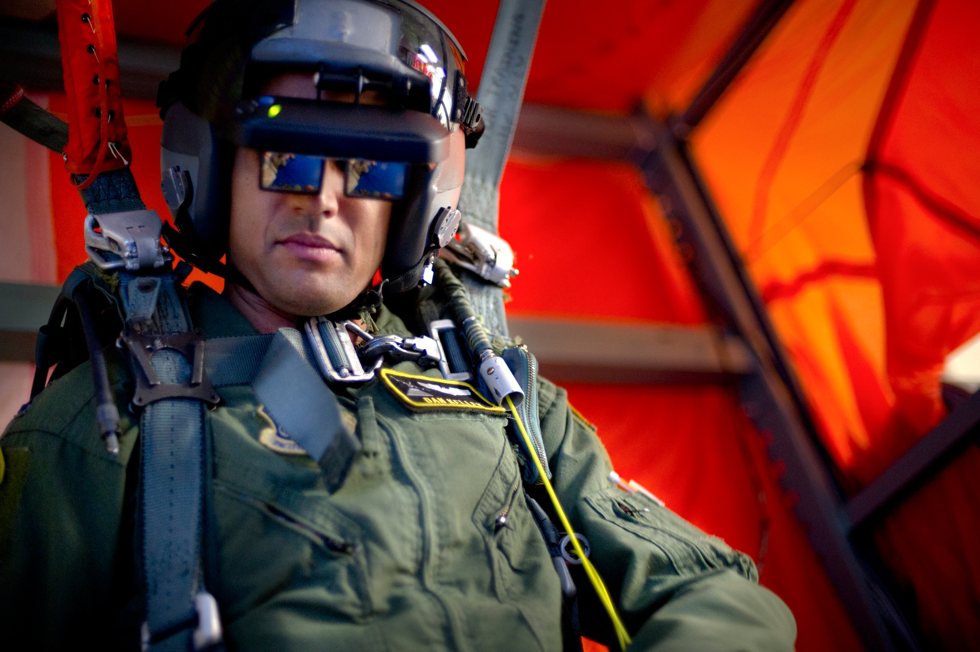 YOKOTA AIR BASE, Japan -- Capt. Dan Kelley, 36th Air Lift Squadron, uses the parachute simulator during survival, evasion, resistance and escape training July 25, 2012 at Yokota Air Base, Japan. The parachute simulator gives aircew members practice techniques for a safe parachute landing.(U.S. Air Force photo by Staff Sgt Stacy Moless)