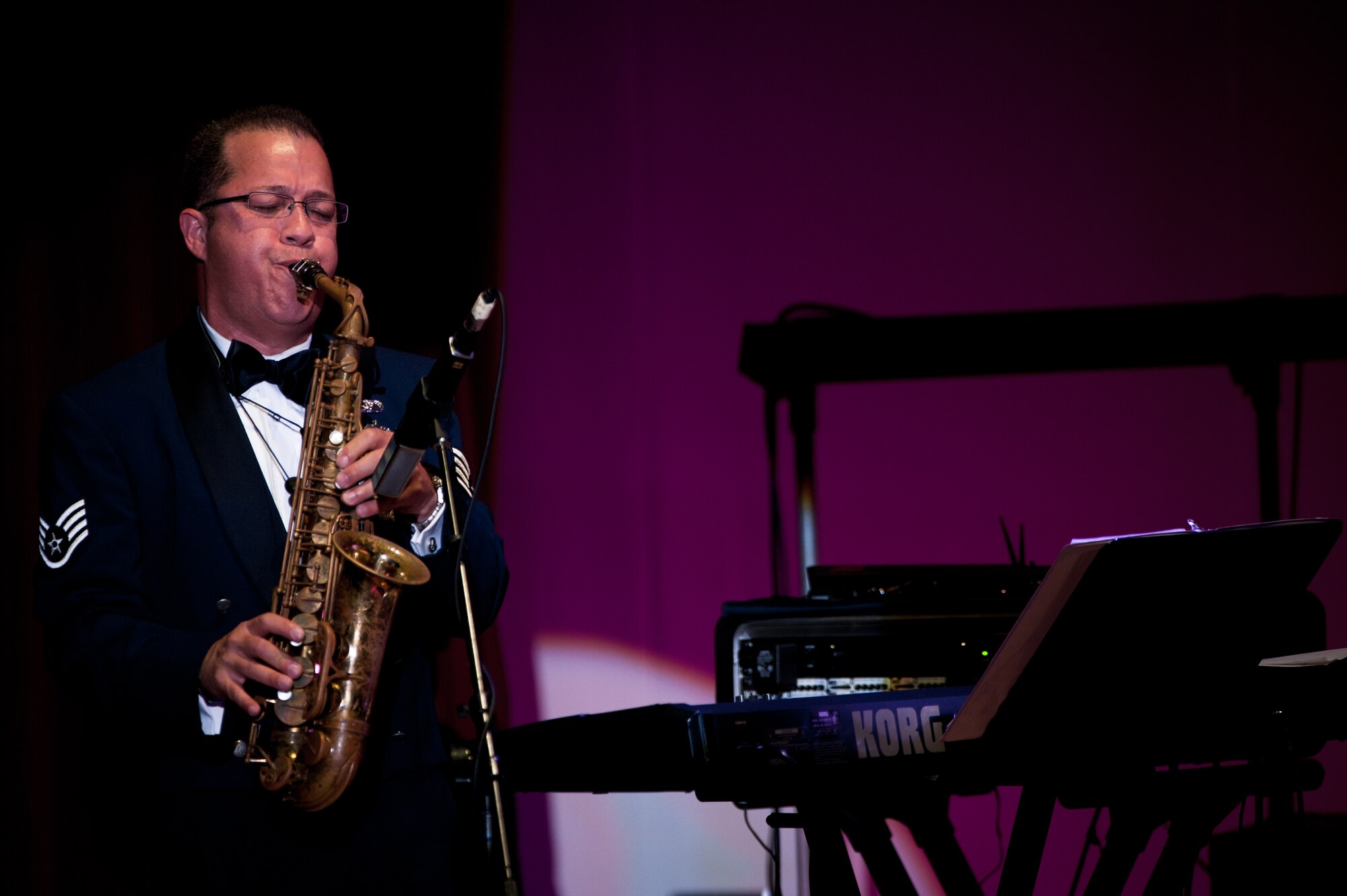 SHIOGAMA CITY, Japan -- Staff Sgt. Marco Muñoz plays the alto saxophone at the Yu Hall, Shiogama City, Miyagi Prefecture, Japan on Aug 7, 2012. Muñoz supports the Band of the Pacific-Asia's ensemble Pacific Trends by playing multiple musical roles on: soprano saxophone, alto saxophone, tenor saxophone, ewi, and keyboard. (U.S. Air Force photo/Staff Sgt. Josh Voyles)