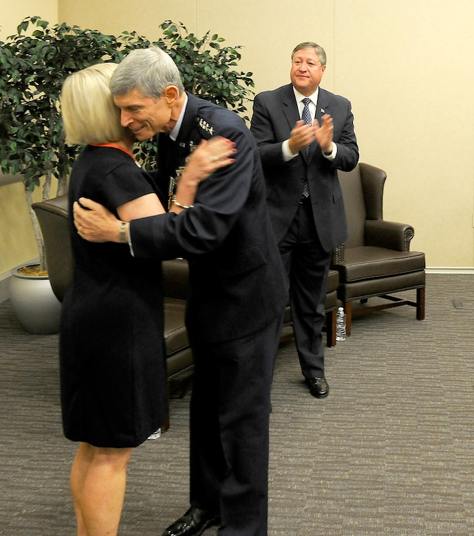 Air Force Chief of Staff Gen. Norton Schwartz embraces his wife Suzie during a ceremony at Joint Base Andrews, Md., Aug. 9, 2012.  Secretary of the Air Force Michael Donley recognized the two for their years of service to the Air Force and the nation.  (U.S. Air Force photo/Scott M. Ash)