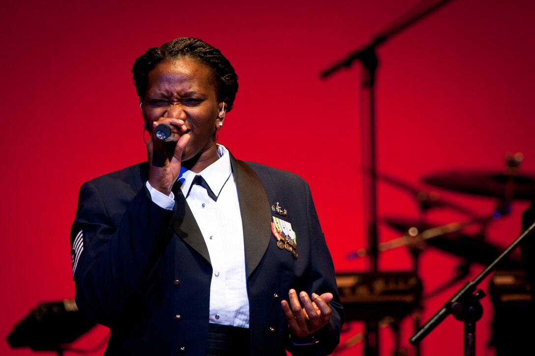 SHIOGAMA CITY, Japan -- Tech. Sgt. Amber Grimes, Band of the Pacific-Asia vocalist, sings at the Yu Hall, Shiogama City, Miyagi Prefecture, Japan on Aug 7, 2012. This was Grimes first tour as a member of the Band of the Pacific-Asia. (U.S. Air Force photo/Staff Sgt. Josh Voyles)