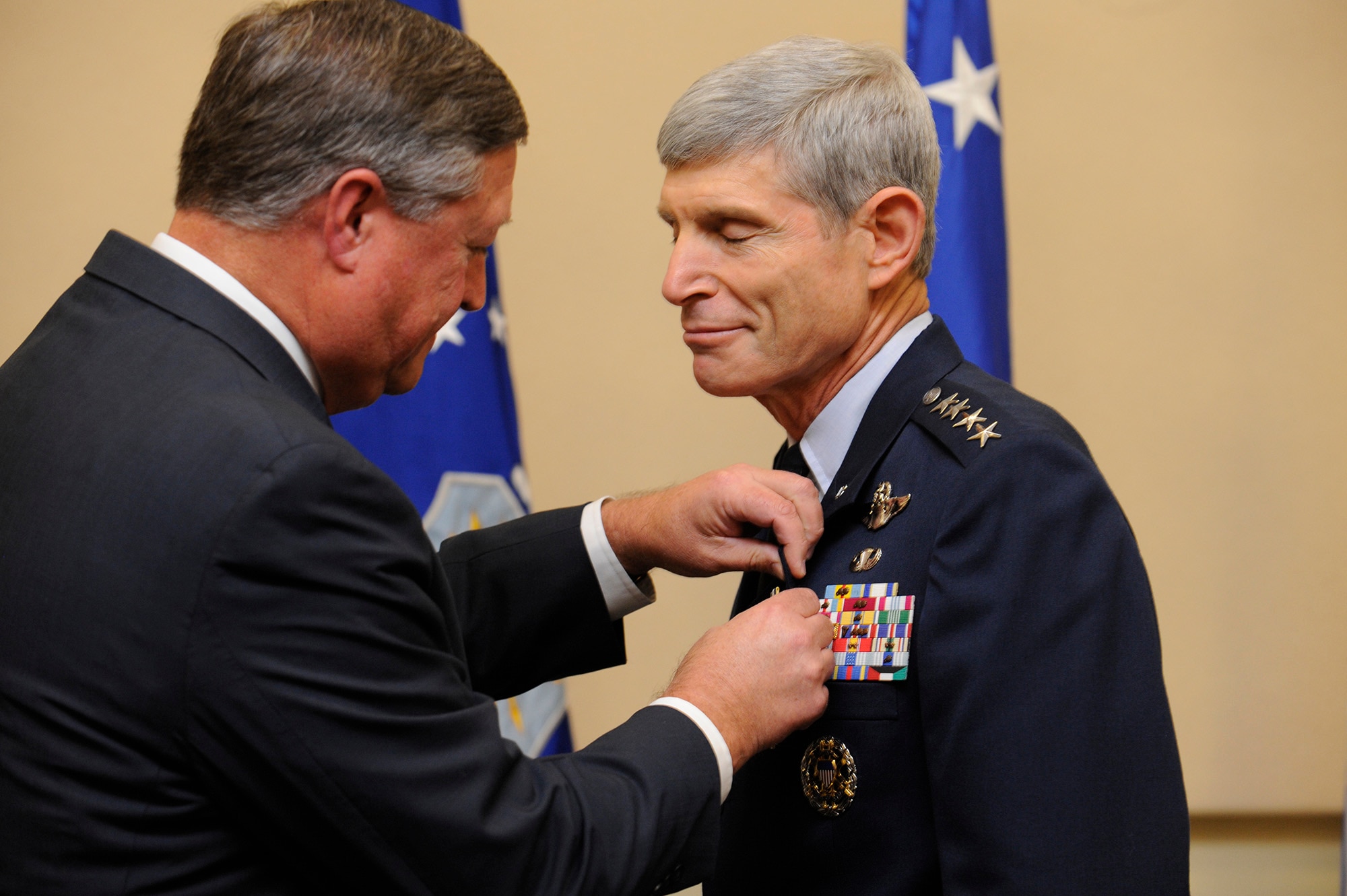 Secretary of the Air Force Michael Donley presents the Distinguished Service Medal to Air Force Chief of Staff Gen. Norton Schwartz in a ceremony at Joint Base Andrews, Md., Aug. 9, 2012.  (U.S. Air Force photo/Scott M. Ash)