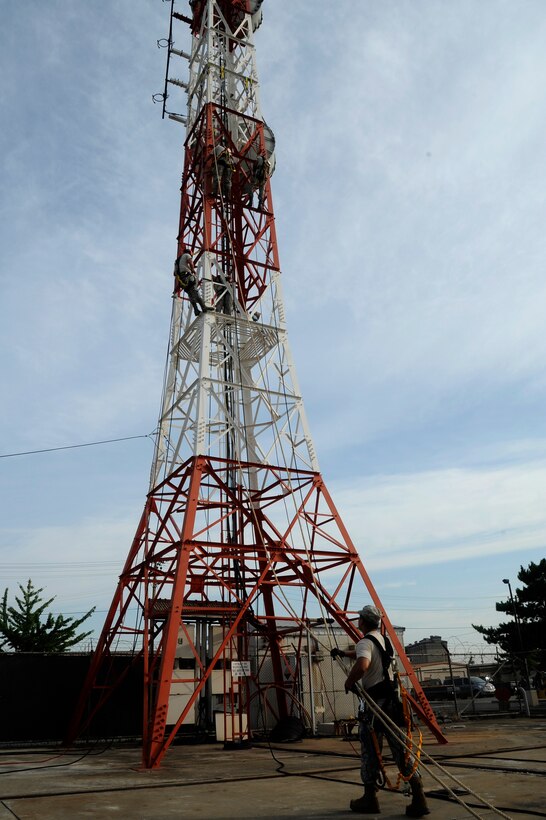 Airman 1st Class Marc Holguin, 8th Communications Squadron cable and antenna, sets up safety lines for the communications tower rescue training at Kunsan Air Base, Republic of Korea, Aug. 8 2012. This training is a yearly requirement of the 8th  CS to ensure they maintain their skill and efficiency. (U.S. Air Force photo/Senior Airman Marcus Morris)