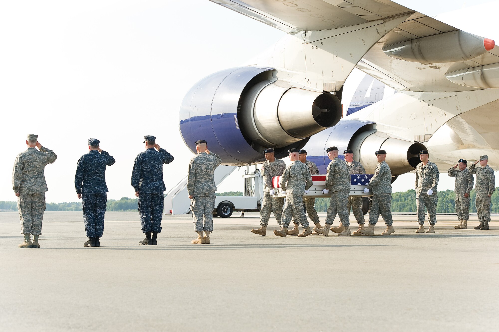 A U.S. Army carry team transfers the remains of Army Spc. Ethan J. Martin, of Lewiston, Idaho, at Dover Air Force Base, Del., Aug. 9, 2012. Martin was assigned to the 1st Squadron, 40th Cavalry Regiment, 4th Brigade Combat Team (Airborne), 25th Infantry Division, Joint Base Elmendorf-Richardson, Alaska (U.S. Air Force photo/Roland Balik)
