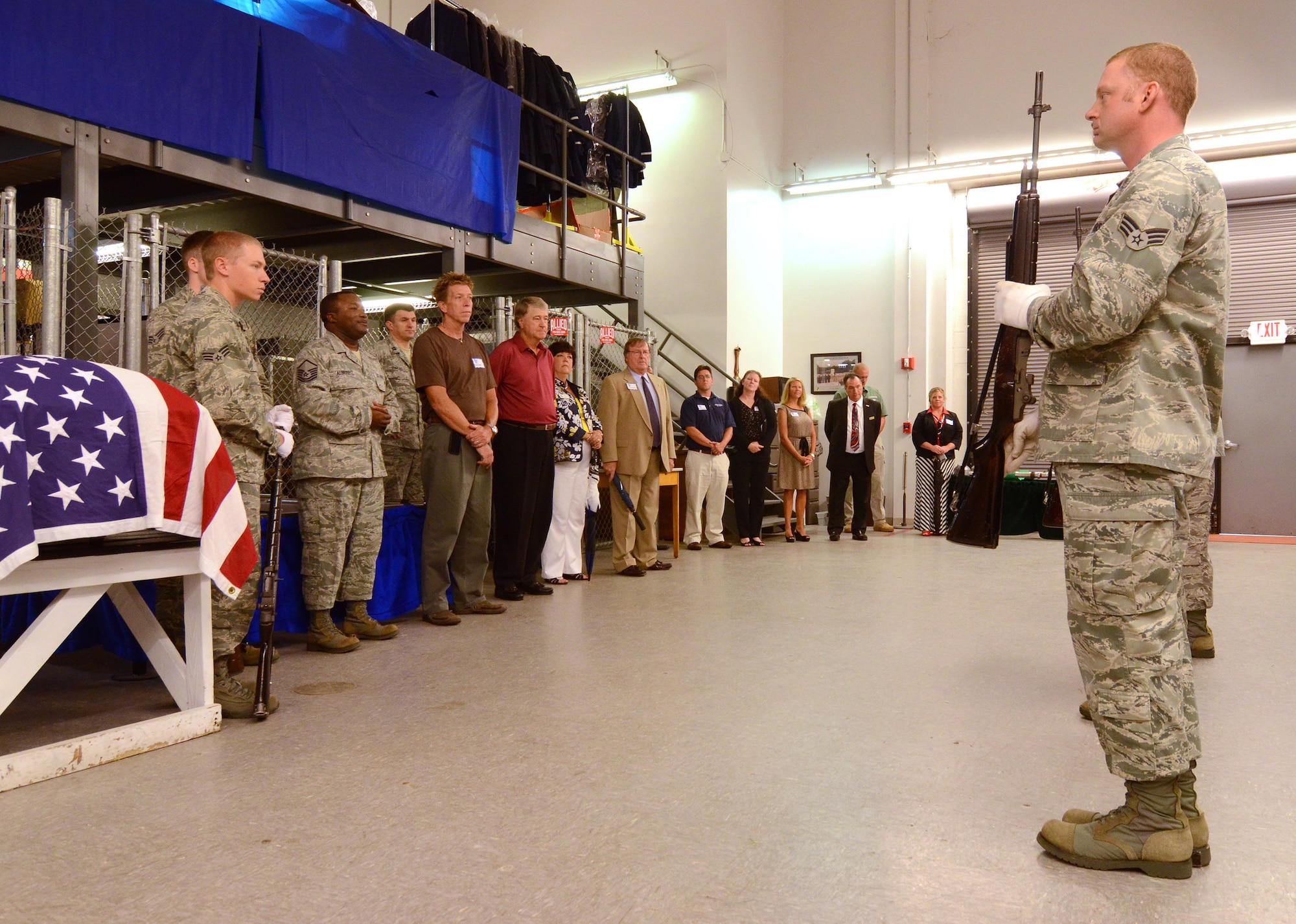 Senior Airman Cameron Janzen performs weapons movements as part of a rifle team demonstration for Hercules Council members at Dobbins Air Reserve Base, Aug. 9. Members of the Hercules Council, comprised of area civic leaders, had lunch on base and visited the 94th Airlift Wing honor guard to get a better understanding of what they do for the local community and region. (U.S. Air Force photo/Brad Fallin)