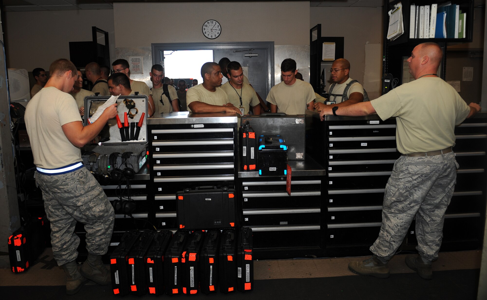 Airmen from the 2nd Aircraft Maintenance Squadron support section distribute and receive equipment from Airmen who were working on the flightline on Barksdale Air Force Base, La., Aug. 8. The 2 AMXS support section distributes, receives, inventories and inspects the equipment used to maintain the B-52H Stratofortress and is responsible for more than 21,000 tools valued at $15 million. (U.S. Air Force photo/Airman 1st Class Benjamin Gonsier)(RELEASED)
