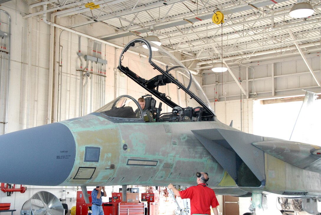 Majs. Christopher "Torch" Coddington and Stephen "Ritalin" D'Amico, 339th Flight Test Squadron pilots, communicate with John Kieweg, F-15 Functional Test Flight Chief, during pre-flight tests at  F-15 Functional Test.(U. S. Air Force photo/Misuzu Allen)