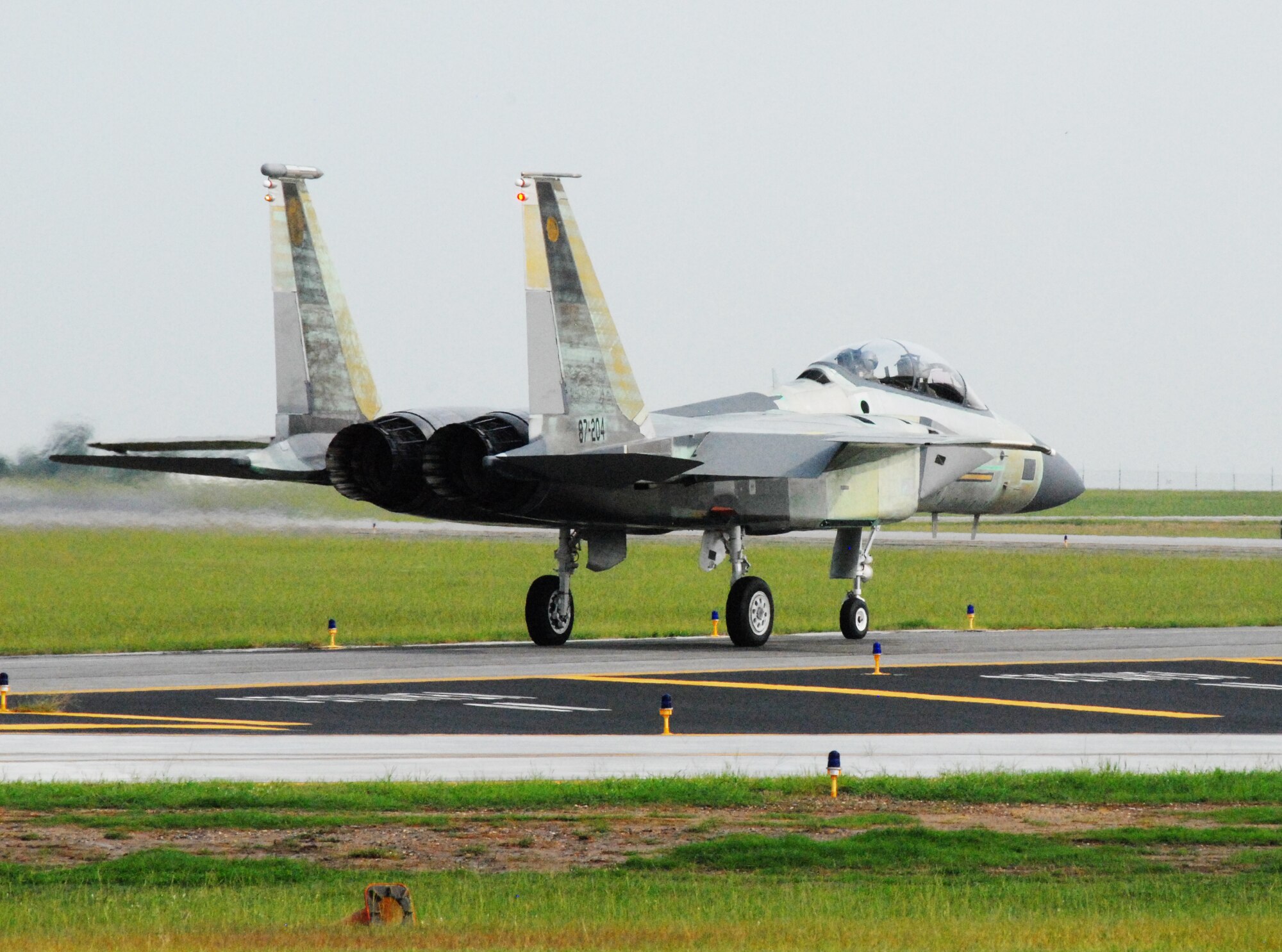 An F-15 taxies to the Robins runway for a test flight. (U. S. Air Force photo/Misuzu Allen)